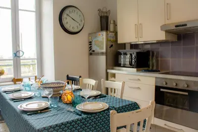 Cuisine ou kitchenette dans l'établissement La Bigoudène