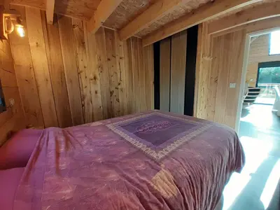Un ou plusieurs lits dans un hébergement de l'établissement Ecolodge des Monts d'Arrée & spa