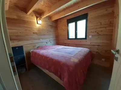 Un ou plusieurs lits dans un hébergement de l'établissement Ecolodge des Monts d'Arrée & spa