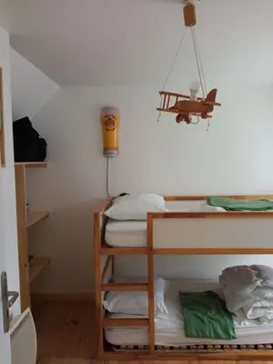 Un ou plusieurs lits dans un hébergement de l'établissement Le calme zen