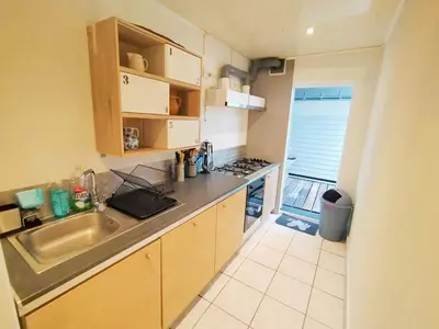 Cuisine ou kitchenette dans l'établissement Au bonheur des voyageurs