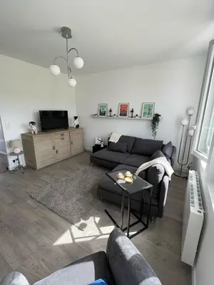 Télévision ou salle de divertissement dans l'établissement Maison de ville à la mer très bien équipée proche centre avec commerces