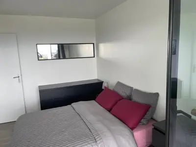 Un ou plusieurs lits dans un hébergement de l'établissement appartement T2 Brest