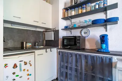 Cuisine ou kitchenette dans l'établissement Le Ptit Loup de Mer - Appt proche plage terrasse
