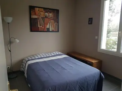Un ou plusieurs lits dans un hébergement de l'établissement Le Chalet de l'Odet
