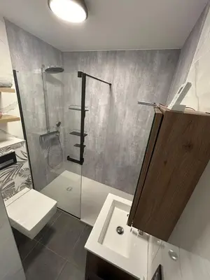 Salle de bains dans l'établissement Les pieds dans l'eau