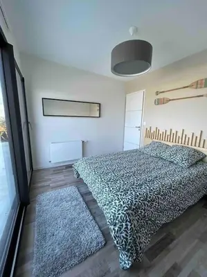 Un ou plusieurs lits dans un hébergement de l'établissement Maison moderne avec vue sur mer