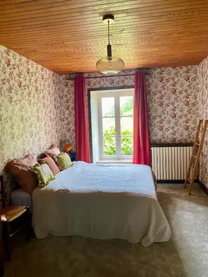 Un ou plusieurs lits dans un hébergement de l'établissement Maison entre campagne et mer