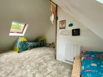 Un ou plusieurs lits dans un hébergement de l'établissement Maison entre campagne et mer