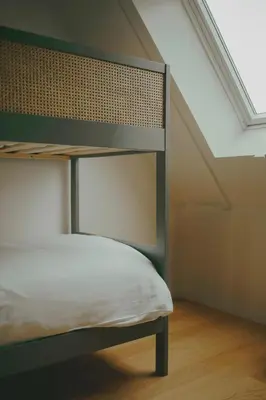 Un ou plusieurs lits dans un hébergement de l'établissement Maisons Bodenn - Lesconil