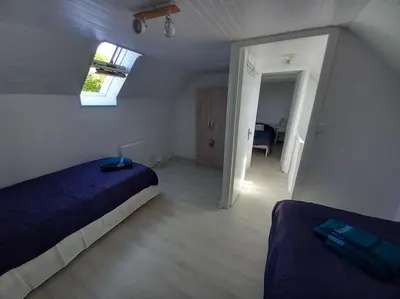 Un ou plusieurs lits dans un hébergement de l'établissement Gîte entre Mer et Abers