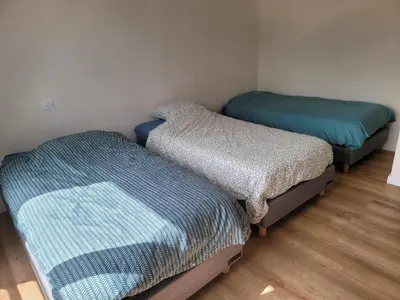 Un ou plusieurs lits dans un hébergement de l'établissement Villa l'estran récente vue mer Plounéour-Brignogan-plages