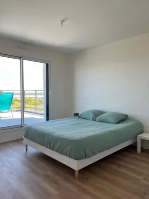 Un ou plusieurs lits dans un hébergement de l'établissement Villa l'estran récente vue mer Plounéour-Brignogan-plages