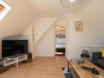 Télévision ou salle de divertissement dans l'établissement Holiday Home La Roselière by Interhome
