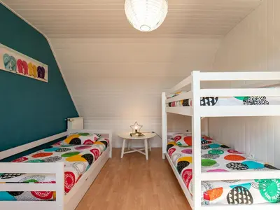 Un ou plusieurs lits dans un hébergement de l'établissement Holiday Home La Roselière by Interhome