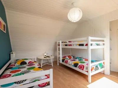 Un ou plusieurs lits dans un hébergement de l'établissement Holiday Home La Roselière by Interhome