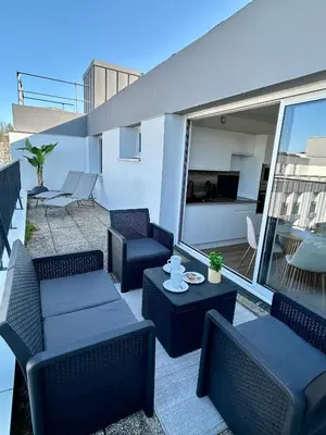 Coin salon dans l'établissement Charmant T2 avec grande terrasse à proximité immédiate du centre ville