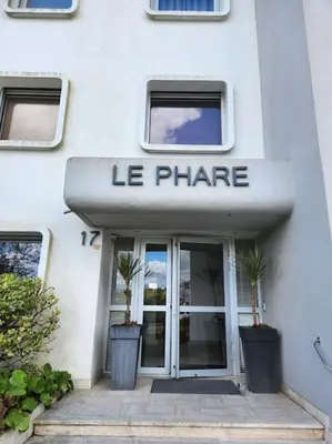 Façade ou entrée de l'établissement Studio les pieds dans l'eau et Parking