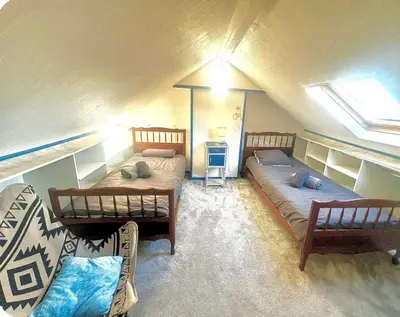 Coin salon dans l'établissement Très belle Maison Familiale Kernizan à 800m de la plage