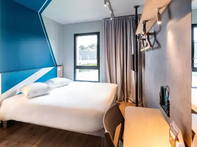 Un ou plusieurs lits dans un hébergement de l'établissement ibis budget Morlaix