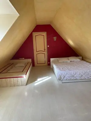 Un ou plusieurs lits dans un hébergement de l'établissement Villa vue mer