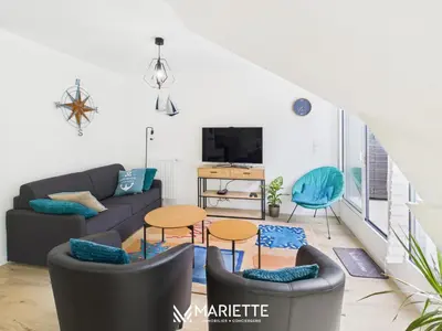 Télévision ou salle de divertissement dans l'établissement -AUSTRAL- Beau T3 a 200 m des plages