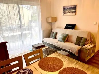 Coin salon dans l'établissement Appartement T3 avec piscine en résidence 4 étoiles