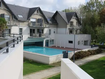Piscine de l'établissement Appartement T3 avec piscine en résidence 4 étoiles ou située à proximité