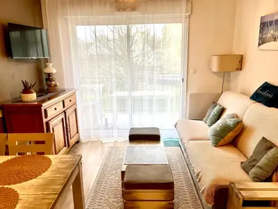 Coin salon dans l'établissement Appartement T3 avec piscine en résidence 4 étoiles