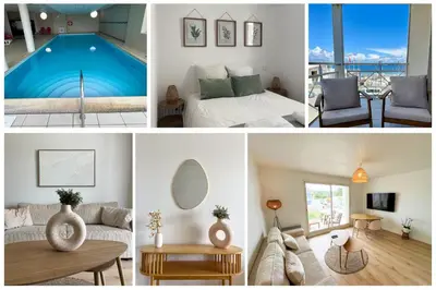 Coin salon dans l'établissement Appartement Cosy, terrasse vu mer, piscine, Sauna - WarmHouse