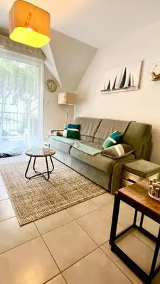 Coin salon dans l'établissement La Riviera à 50m de la plage