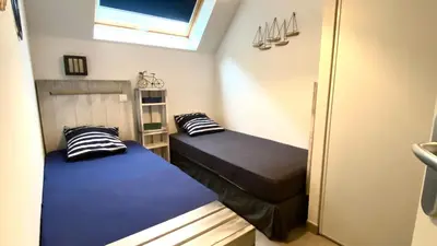 Un ou plusieurs lits dans un hébergement de l'établissement La Riviera à 50m de la plage