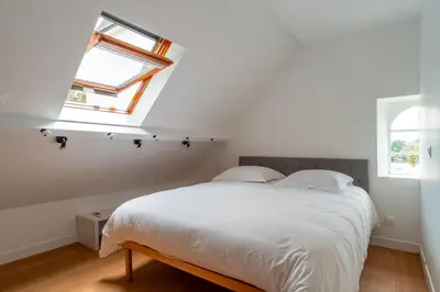 Un ou plusieurs lits dans un hébergement de l'établissement La Timonerie - Appt climatisé à Bénodet