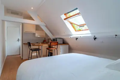 Un ou plusieurs lits dans un hébergement de l'établissement La Timonerie - Appt climatisé à Bénodet