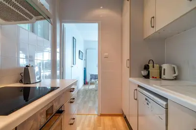 Cuisine ou kitchenette dans l'établissement Le Savenn - Appt vue mer 4p à Bénodet