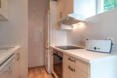 Cuisine ou kitchenette dans l'établissement Le Savenn - Appt vue mer 4p à Bénodet