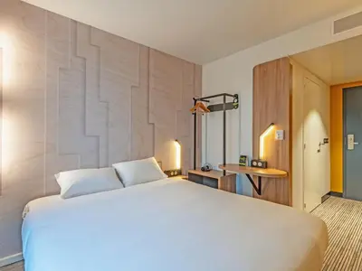 Un ou plusieurs lits dans un hébergement de l'établissement B&B HOTEL Brest Porte de Gouesnou