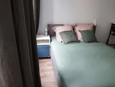 Un ou plusieurs lits dans un hébergement de l'établissement Studio - Centre-ville