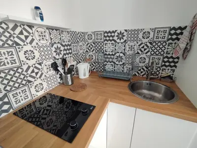 Cuisine ou kitchenette dans l'établissement Studio - Centre-ville
