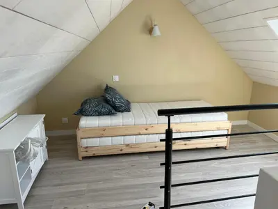 Un ou plusieurs lits dans un hébergement de l'établissement Ty Mein