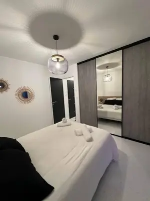 Un ou plusieurs lits dans un hébergement de l'établissement Maison FlaCeLo