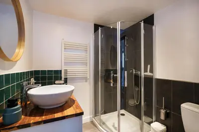 Salle de bains dans l'établissement Le Cocon Ciné