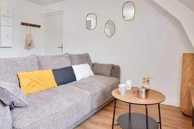 Coin salon dans l'établissement À 230m de la plage - Bel appartement pour 4