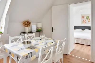 Un ou plusieurs lits dans un hébergement de l'établissement À 230m de la plage - Bel appartement pour 4