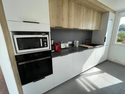 Cuisine ou kitchenette dans l'établissement Ty Queff Lodge