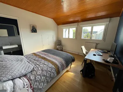 Un ou plusieurs lits dans un hébergement de l'établissement Ty Queff Lodge