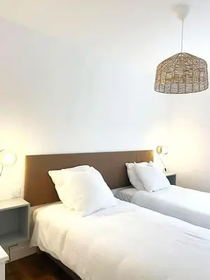Un ou plusieurs lits dans un hébergement de l'établissement Appartement cosy