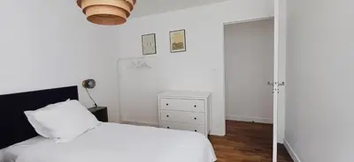 Un ou plusieurs lits dans un hébergement de l'établissement Appartement cosy