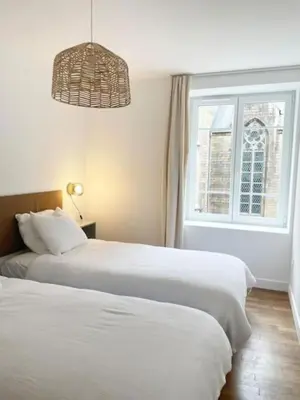 Un ou plusieurs lits dans un hébergement de l'établissement Appartement cosy