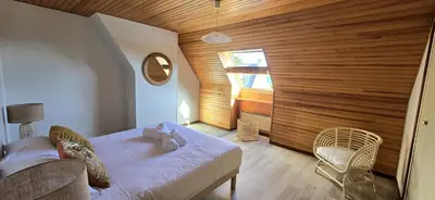 Un ou plusieurs lits dans un hébergement de l'établissement Maison vue mer Crozon - Jacuzzi - Sauna